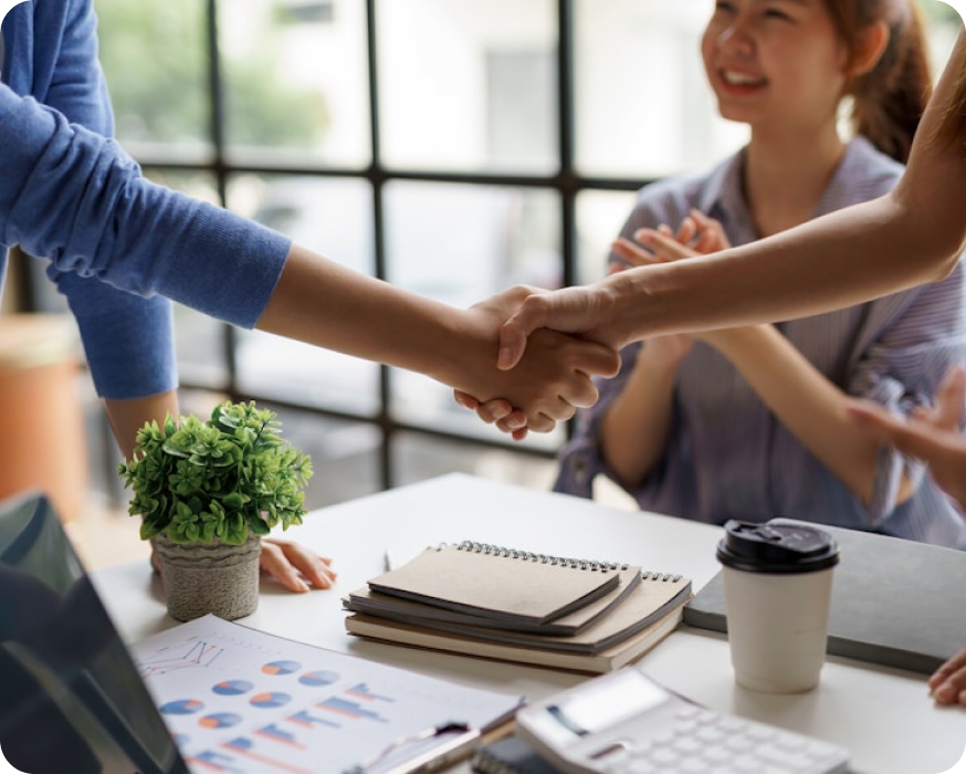 Business leaders shaking hands